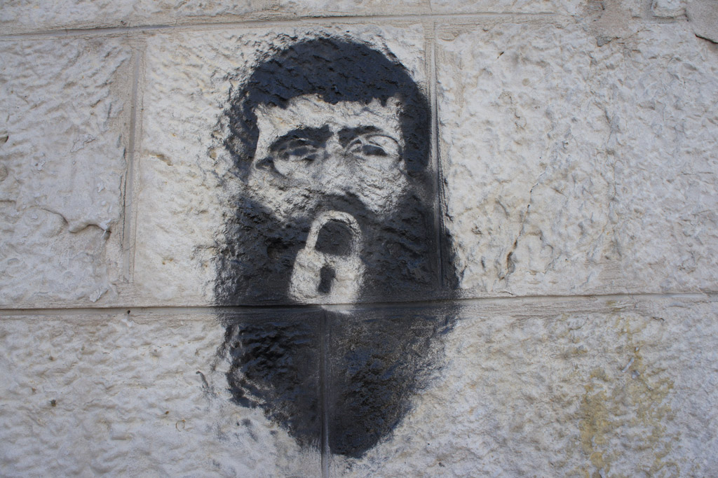 Khader Adnan stencil on a wall by Manara square, Ramallah | Photo by: My Own | Via: Creative Commons | Licensed under: Public Domain