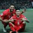 Mohammed Darwish (left) and Jonathan Zorrilla (right) celebrate the opening goal by Zorrilla