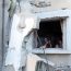 Israeli bombs hit a UN shelter in July 2014 | Photo by: Mohammed Zaanoun