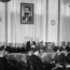 David Ben-Gurion (First Prime Minister of Israel) publicly pronouncing the Declaration of the State of Israel, May 14 1948, Tel Aviv, Israel, beneath a large portrait of Theodor Herzl, founder of modern political Zionism.