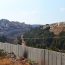 Palestinian communities and Israeli settlements are divided by the separation barrier in east Jerusalem | Photo by: Eoghan Rice | Via: Flickr | Licensed under: CC BY 2.0