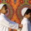 Young Muslims hold a cuddly toy lamb, symbolic of that which was sacrificed by the Prophet Abraham | Photo by: Mohammed Zaanoun